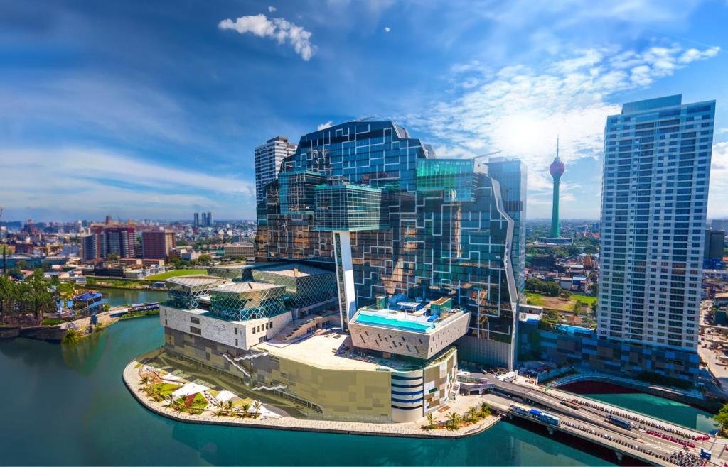 Cinnamon Life Colombo luxury hotel exterior view overlooking Beira Lake