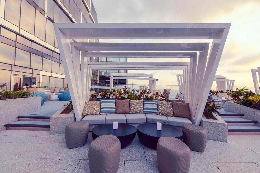 Rooftop infinity pool at Cinnamon Life Colombo with skyline view