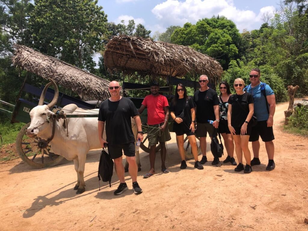Australian travellers enjoying a Sri Lanka village tour with traditional bull cart cultural experience