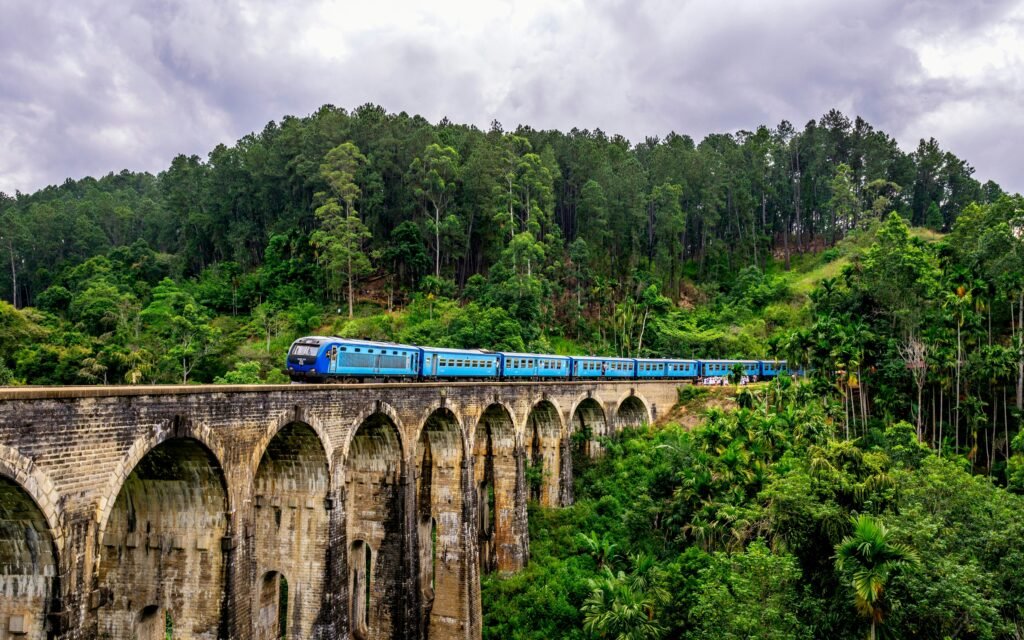 Scenic train ride crossing Nine Arches Bridge in Ella Sri Lanka during a 10 day private tour package